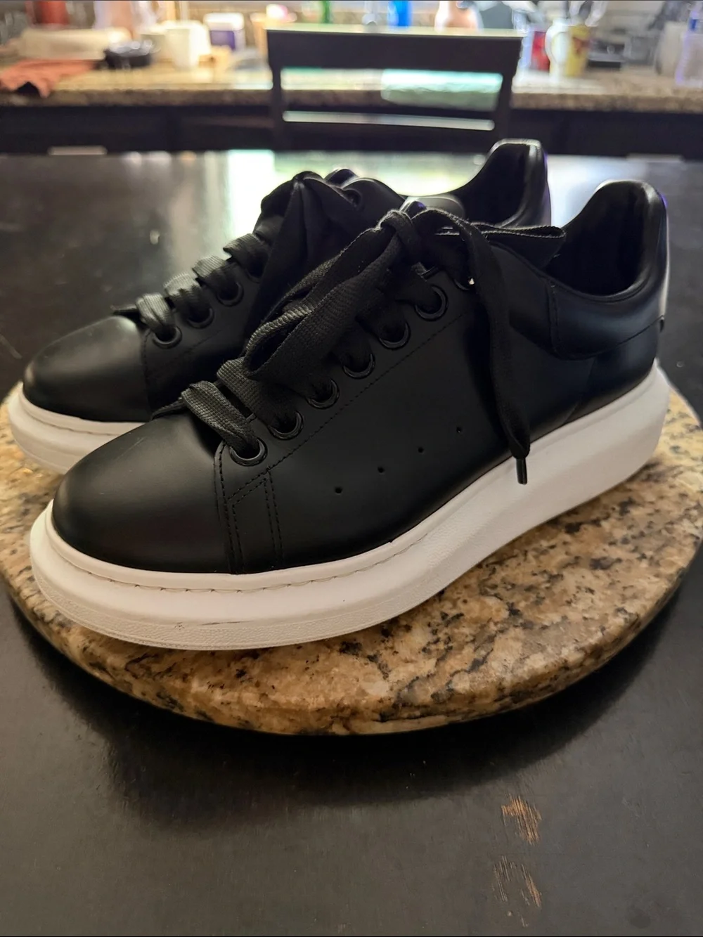 Alexander McQueen Women’s Oversized Black Leather Sneakers with White Platform